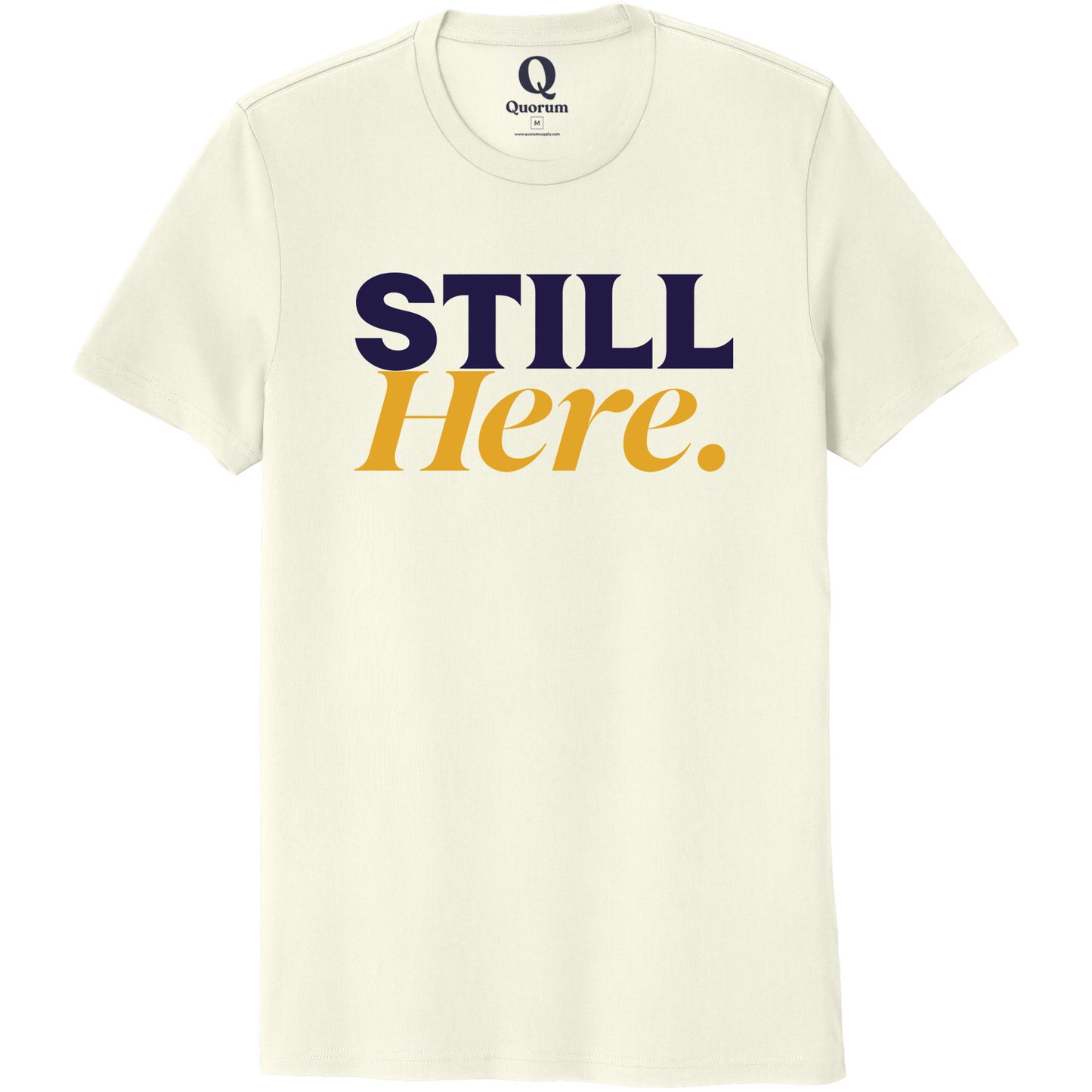 "Still Here." Quorum Unisex 100% Organic Cotton Tee front print in White Sand