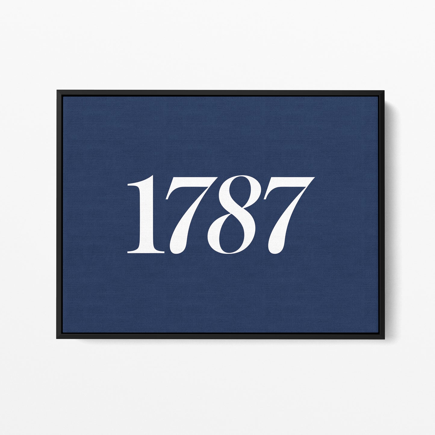 1787 — Quorum framed gallery canvas in black hardwood floater frame, landscape orientation