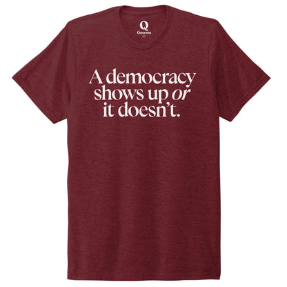 "A democracy shows up or it doesn't." Quorum Unisex Tri-Blend Tee editorial print in Vino Red