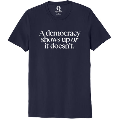 "A democracy shows up or it doesn't." Quorum Unisex 100% Organic Cotton Tee editorial print in Night Sky Navy