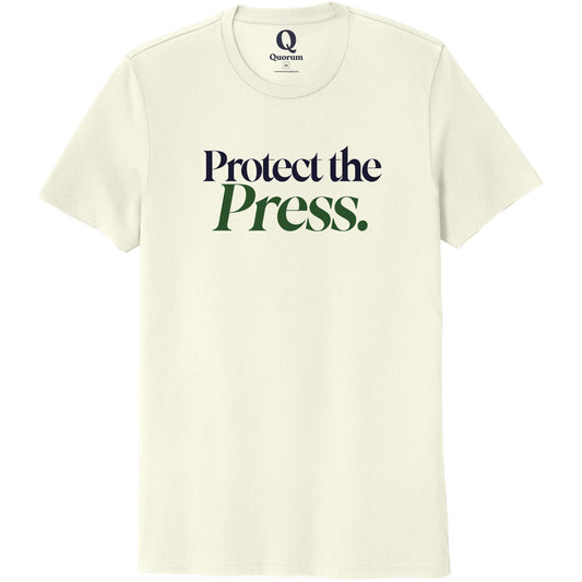 "Protect the Press." Quorum Unisex 100% Organic Cotton Tee front print in White Sand