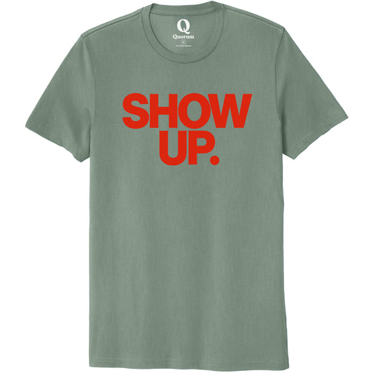 "Show up. Stand up. Suit up." Quorum Unisex 100% Organic Cotton Tee front print in Matcha Green