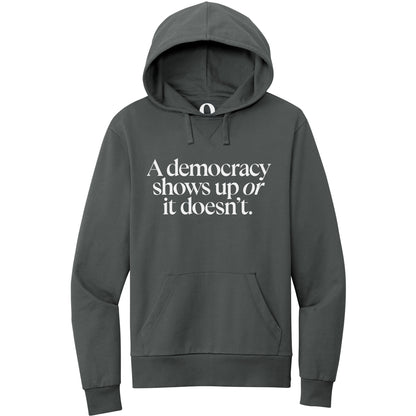 "A democracy shows up or it doesn't." Quorum Pullover Hoodie editorial print in Terrain Grey