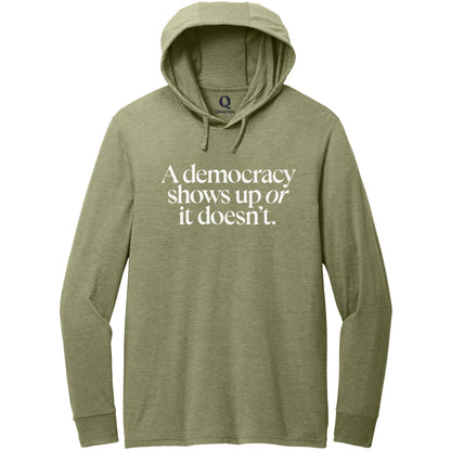 "A democracy shows up or it doesn't." Quorum Tri-Blend Hoodie Tee editorial print in Olive You Green
