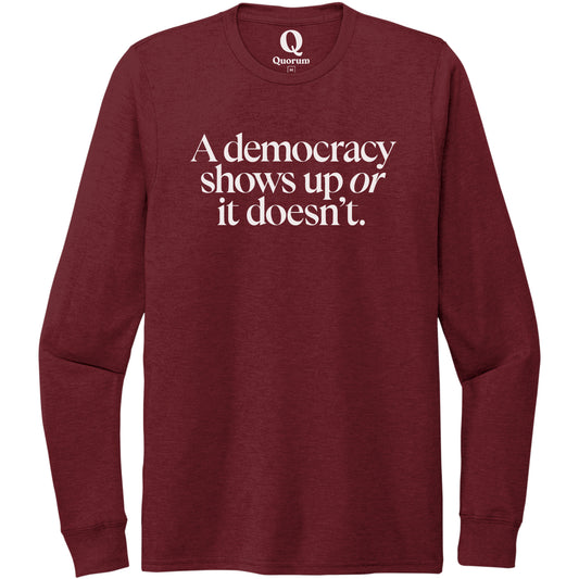 "A democracy shows up or it doesn't." Quorum Unisex Tri-Blend Long Sleeve editorial print in Vino Red