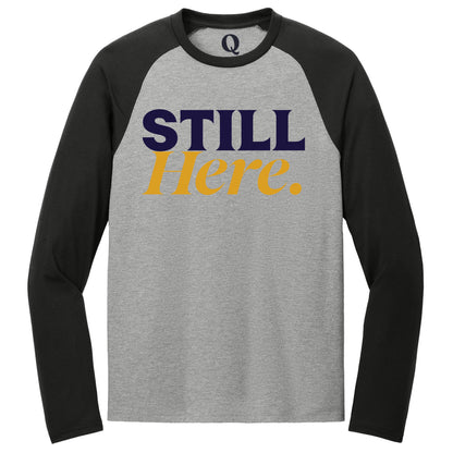 "Still Here." Quorum Tri-Blend Colorblock Raglan front print in Deep Black / Aluminum Grey