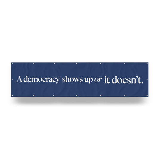 "Democracy Shows Up." — Quorum vinyl banner
