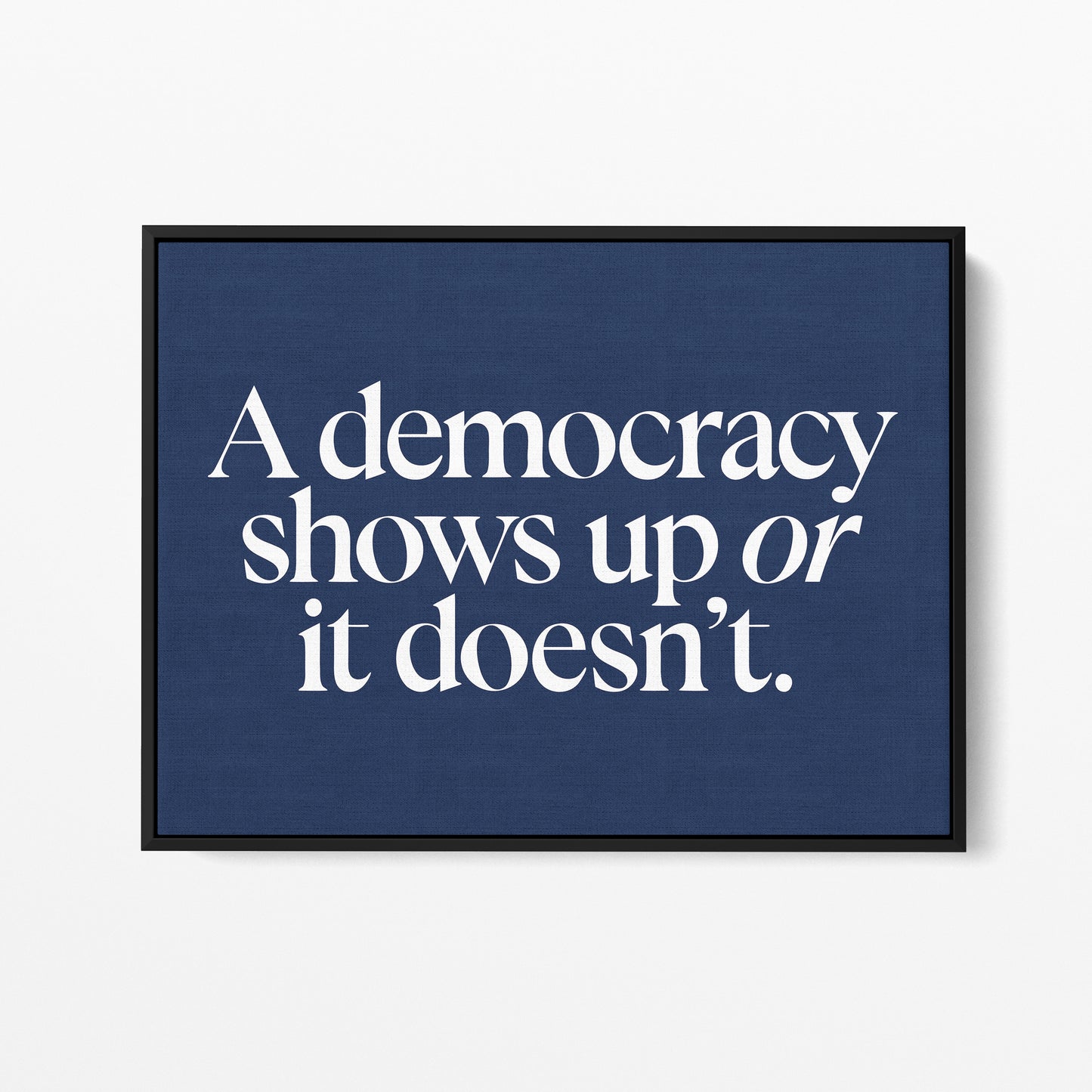 Democracy Shows Up — Quorum framed gallery canvas in black hardwood floater frame, landscape orientation