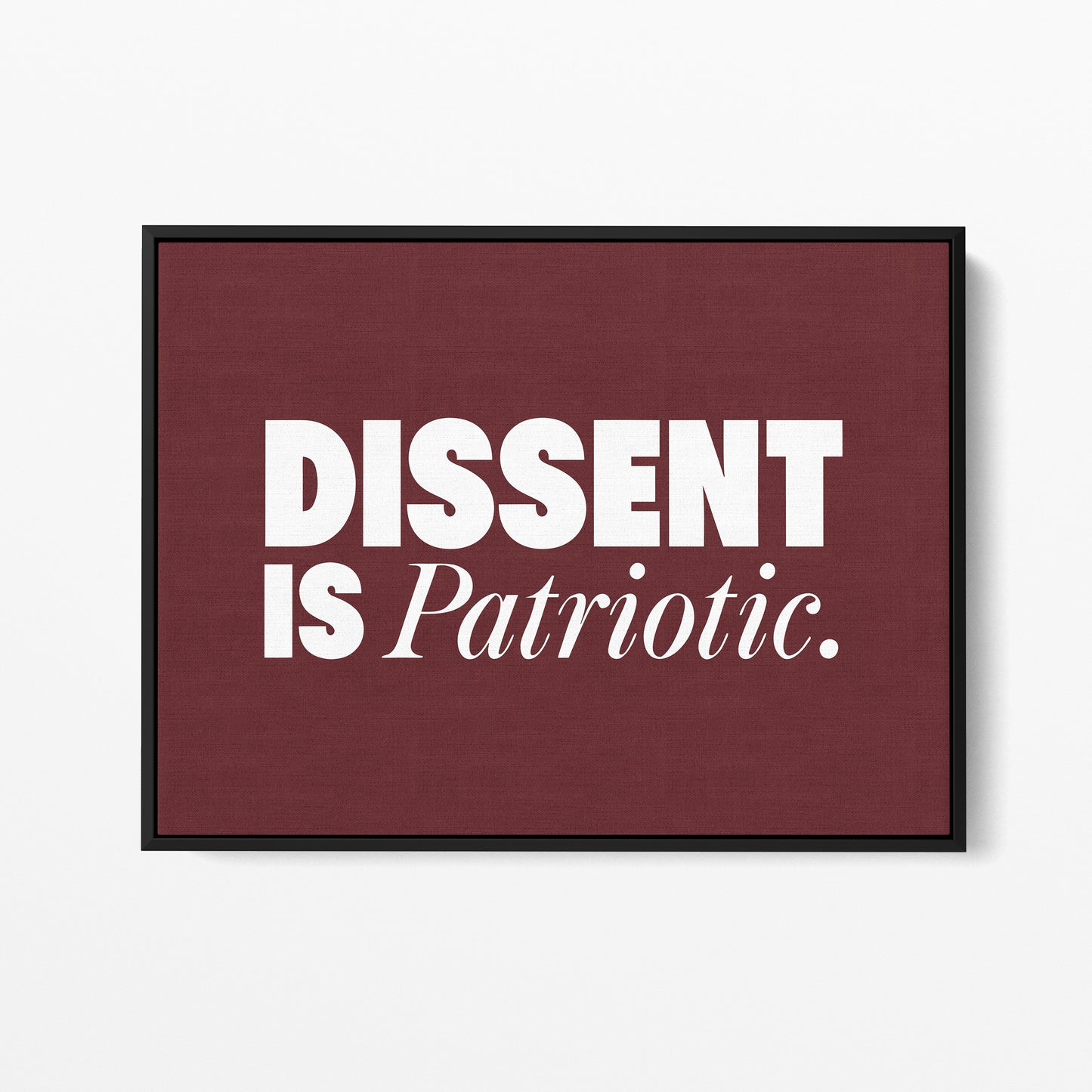 Dissent Is Patriotic — Quorum framed gallery canvas in black hardwood floater frame, landscape orientation
