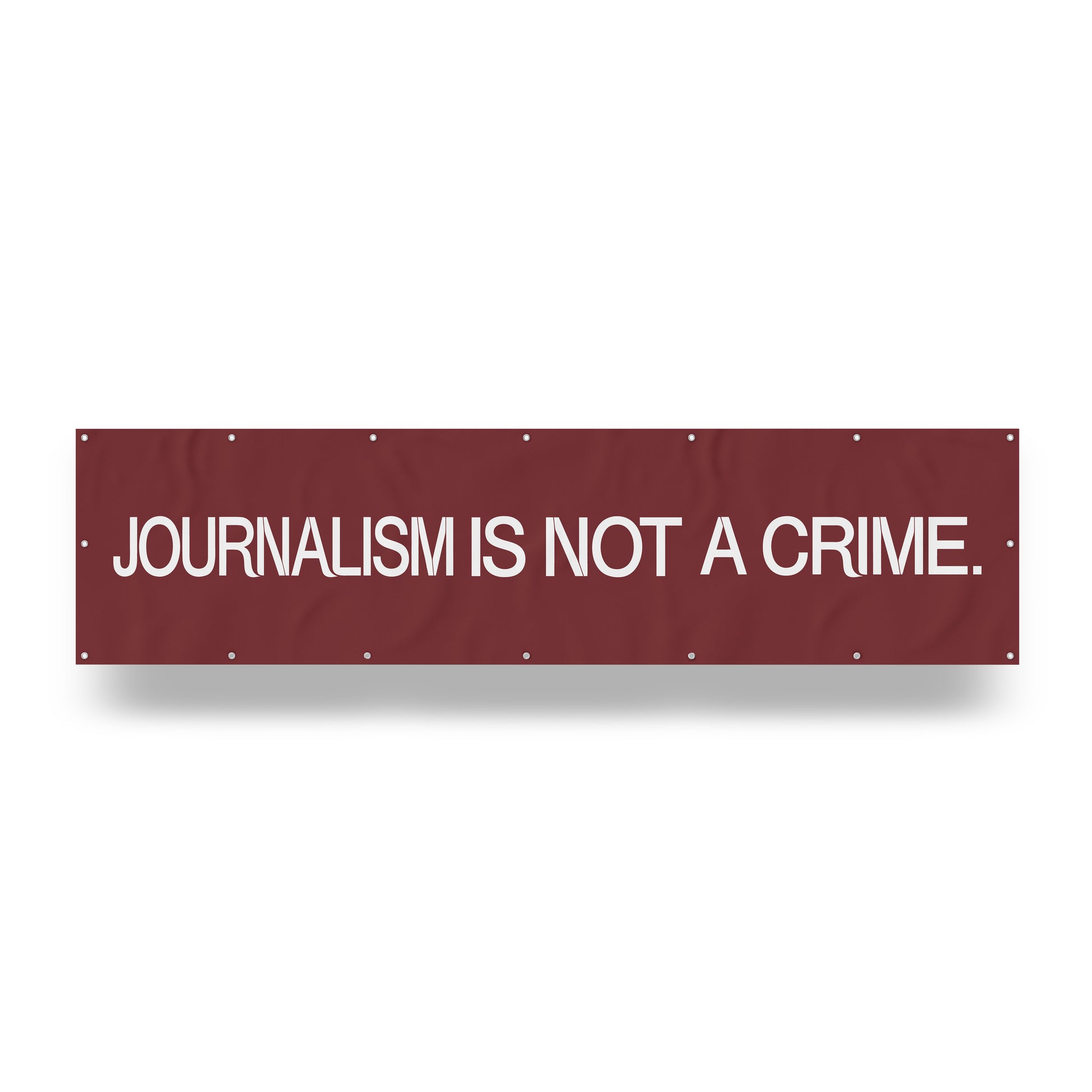 "Journalism is Not a Crime." — Quorum vinyl banner