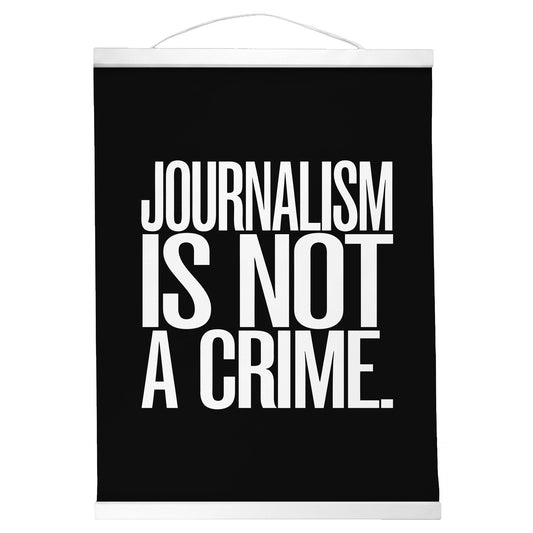 "Journalism Is Not a Crime." — Quorum Hanging Canvas, Sign Black type on pure white canvas with black hanger