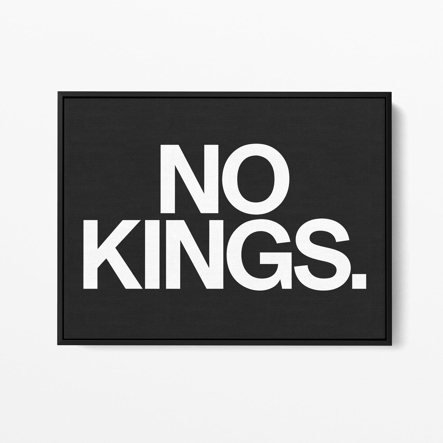 No Kings — Quorum framed gallery canvas in black hardwood floater frame, landscape orientation