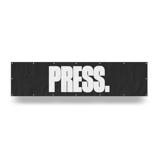 "Press." — Quorum vinyl banner
