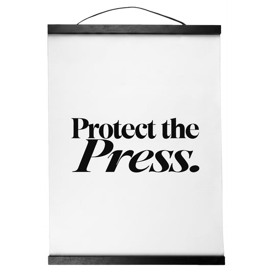 "Protect the Press." — Quorum Hanging Canvas, pure white type on Sign Black canvas with white hanger