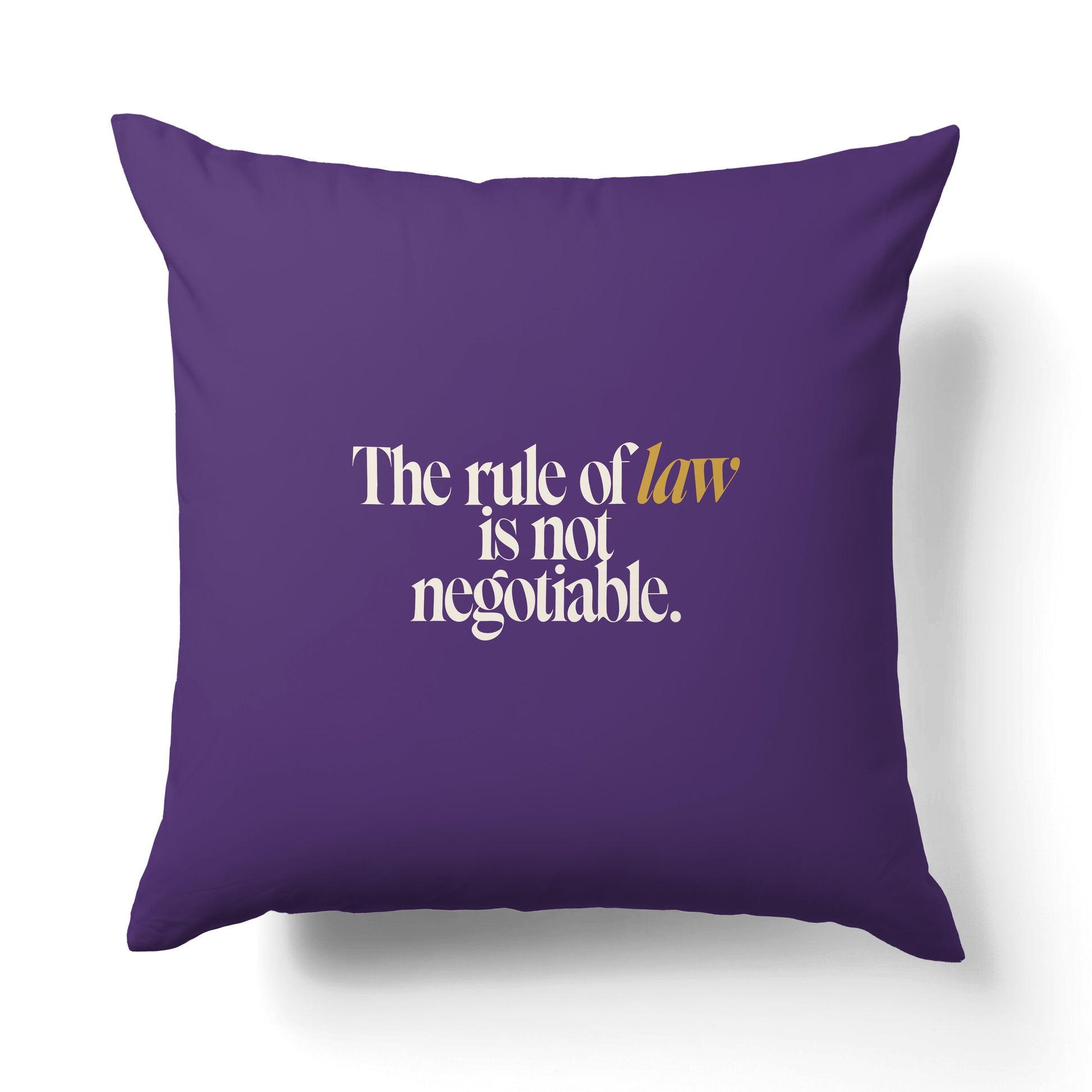 "Rule of law." — Quorum Pillow on Courts Purple canvas