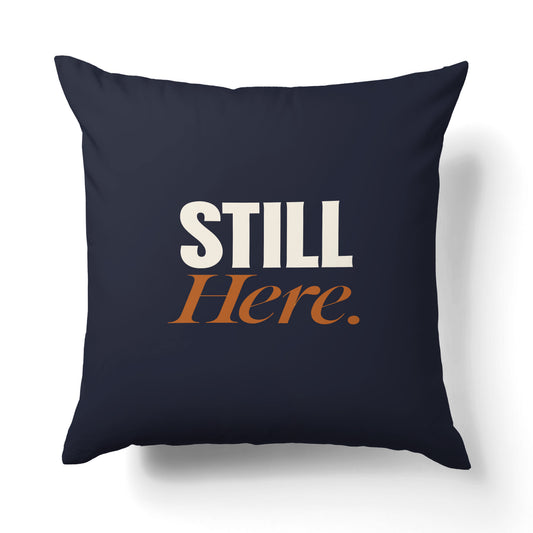 "Still here." — Quorum Pillow on Honest Gold canvas