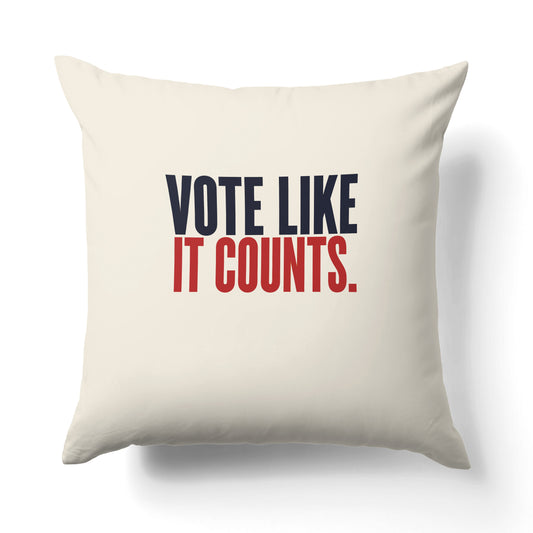 "Vote like it counts." — Quorum Pillow on Penguin Red canvas